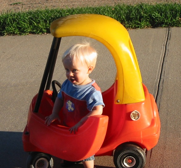 Getting in and out is his favorite car activity.